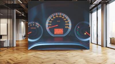 Odometer Speed in car with orange light showing about gas running out of petrol sign Wall mural