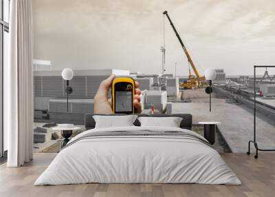 finding the right position inside a construction site via gps Wall mural