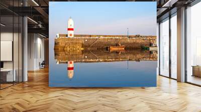 Old Lighouse and two Boats with water Reflection Wall mural