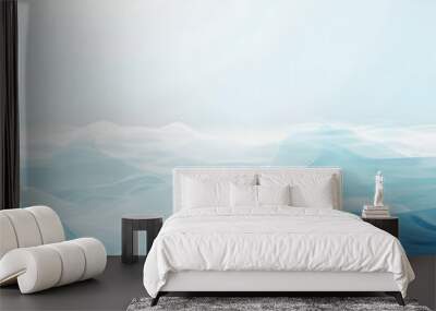 A blue ocean with mountains in the background Wall mural