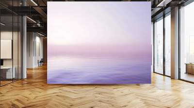 A calm, serene ocean with a pink and purple sky in the background. The water is still and the sky is filled with stars Wall mural