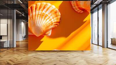 A row of orange shells on a yellow background. The shells are arranged in a way that creates a sense of depth and perspective. The bright colors of the shells Wall mural