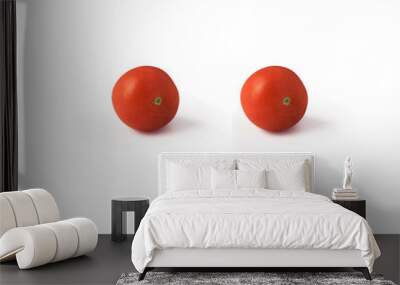 Two tomatoes isolated on white background Wall mural