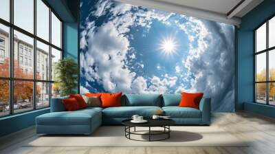 Fisheye lens picture of clouds on blue sky Wall mural