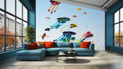 Colorful kites flying in the sky Wall mural