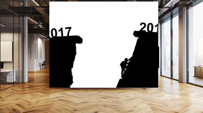 Young man climbing between 2017 and 2018 years. Happy new years concept isolated on white background Wall mural