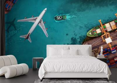 Aerial view and top view cargo plane flying above ship port in the export and import business and logistics international goods. Shipping cargo to harbor by crane Wall mural