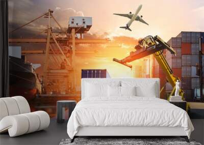 Container truck in ship port for business Logistics and transportation of Container Cargo ship and Cargo plane with working crane bridge in shipyard at sunrise, logistic import export and transport  Wall mural