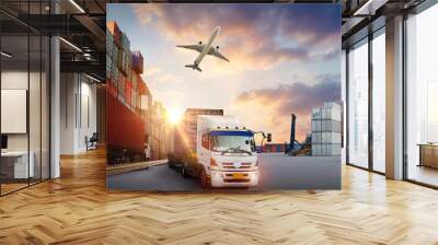 Container truck in ship port for business Logistics and transportation of Container Cargo ship and Cargo plane with working crane bridge in shipyard at sunrise, logistic import export and transport  Wall mural