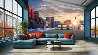 Container truck in ship port for business Logistics and transportation of Container Cargo ship and Cargo plane with working crane bridge in shipyard at sunrise, logistic import export and transport  Wall mural