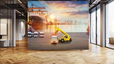 Container truck in ship port for business Logistics and transportation of Container Cargo ship and Cargo plane with working crane bridge in shipyard at sunrise, logistic import export concept	 Wall mural