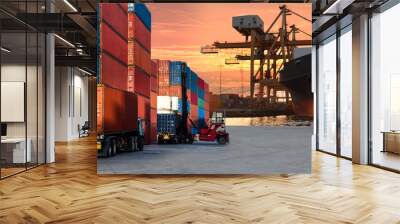 Logistics and transportaIndustrial Container Cargo freight ship, forklift handling container box loading for logistic import export and transport industry concept backgroundtransport industry Wall mural