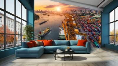 Logistics and transportation of Container Cargo ship and Cargo plane with working crane bridge in shipyard at sunrise, logistic import export and transport industry background Wall mural