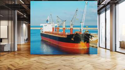 Cargo ship in the harbor Wall mural