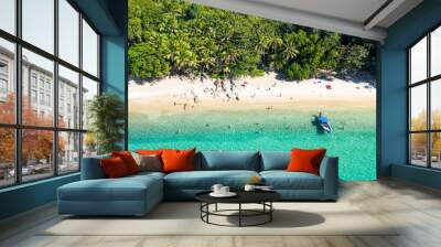 View from above, aerial view of a beautiful tropical beach with white sand, turquoise clear water, long-tail boat and people sunbathing, Banana beach, Phuket, Thailand. Wall mural