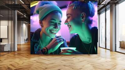 Young smiling lesbian couple in cafe neon lighting interior, attractive young women lovers with multicolored haircut and tattooed face, LGBT openly lesbian dating in public cafe, generative AI Wall mural