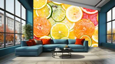 Citrus fruits background various slices top view background. Vitamin c fruits. Wall mural