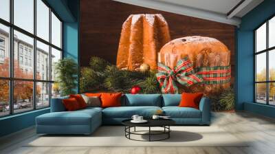 Pandoro and Panettone traditional Italian Christmas sweets on wooden background copy space.  Wall mural