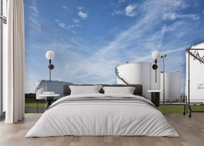 white tanks in tank farm with blue sky Wall mural