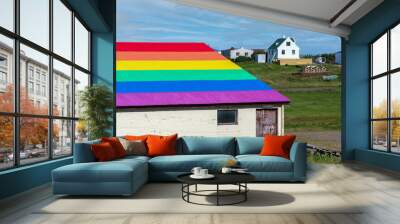 Barn with a rainbow roof supporting equal rights for LGBTQ people community. Westfjords, Iceland Wall mural