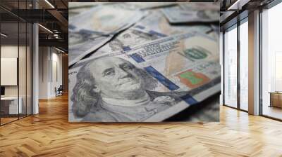 Hundred dollar Ben franklin bills in pile for business and financial concept.  American US dollar federal reserve background texture.  Cash and prosperity for economic impact and financial abundance. Wall mural