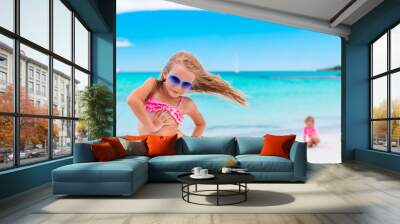 Happy girl enjoy summer vacation on the beach Wall mural