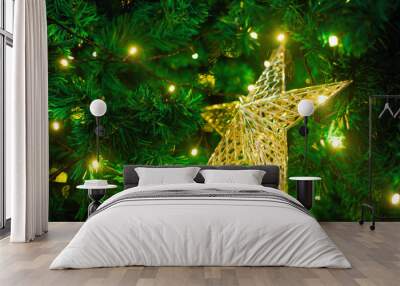 happy day concept Christmas star with beautiful lights on a blurry background on New Year's Day Wall mural