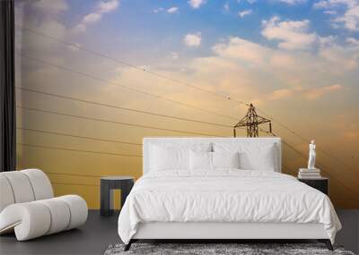 High voltage pole with wires against winter silhouette sky background Wall mural