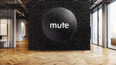 Macro close up photograph of mute button on audio controller.   Wall mural