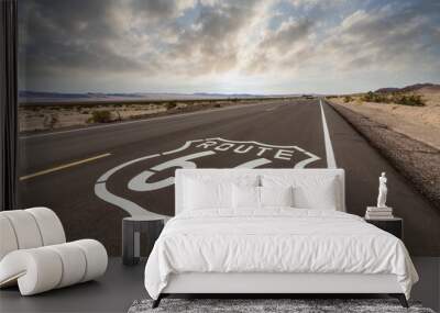 Route 66 highway sign with dawn sky near Amboy in the California Mojave desert.   Wall mural