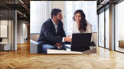 business couple with computer Wall mural