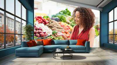 Woman shopping fruits Wall mural