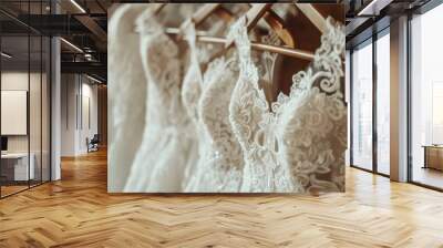 Beautiful elegant luxury bridal dress placed on hangers. White wedding dresses hanging on hanger in bridal shop boutique salon Wall mural