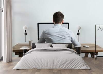 single businessmen working a labtop at wooden desk on the white background Wall mural