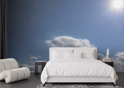 Clouds In Blue Sky. Clear blue skies with fluffy white clouds. Wall mural