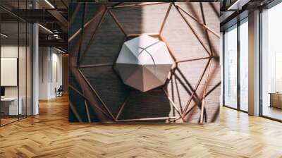 Top view of an octagon geometric shape made of concrete inside a metallic octagon under the sunlight Wall mural