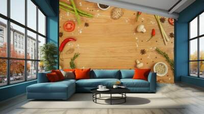 Variety of herbs, spices, fruits and vegetables on the wooden table Wall mural