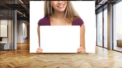 Smiling woman showing blank signboard Wall mural