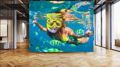 Happy family - girl in snorkeling mask dive underwater with fishes school in coral reef sea pool. Travel lifestyle, water sport outdoor adventure, swimming lessons on summer beach holidays with child. Wall mural