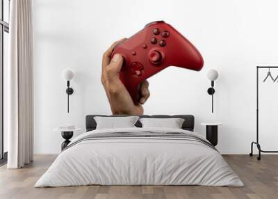 Hand holding a game controller on transparent background Wall mural