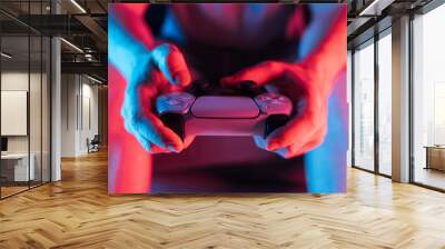 Man hands with game controller in neon light, front view Wall mural