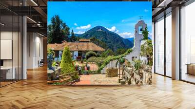 BOGOTA,COLOMBIA/MARCH 15,2018:Park on Montserrat mountain. View of Mount Guadalupe and the statue of Christ Wall mural