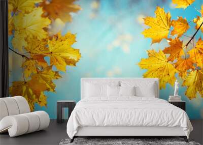 Autumn yellow maple leaves on a blurred forest background, very shallow focus. Colorful foliage in the autumn park. Excellent background on the theme of autumn. Panoramic view. Wall mural