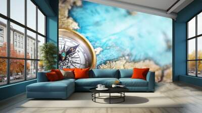 Magnetic compass on world map.Travel, geography, navigation, tourism and exploration concept background. Macro photo. Very shallow focus. Wall mural