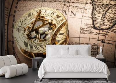 Old compass on vintage map. Retro style. Wall mural