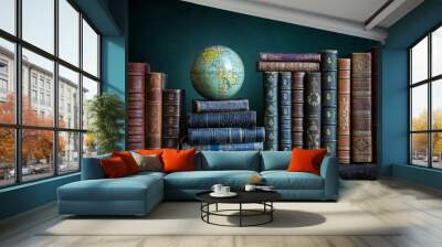 Old geographical globe and old book in cabinet with bookselfs. Science, education, travel background. History and geography team. Ancience, antique globe on the background of books. Wall mural