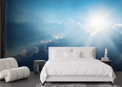 Panoramic view of clouds and sun with beautiful rays against the sky. Wall mural