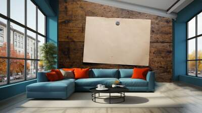 Sheet of paper on an old wooden wall. Canvas, wallpaper for your design. Retro style. Wall mural