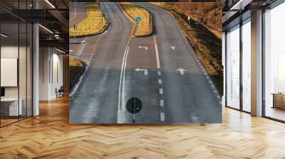 Empty road junction with one plus two lanes. Wall mural