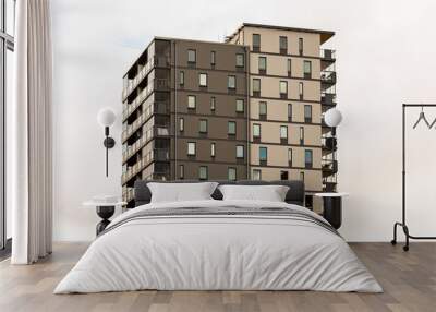 Ten storey high grey apartment building. Wall mural